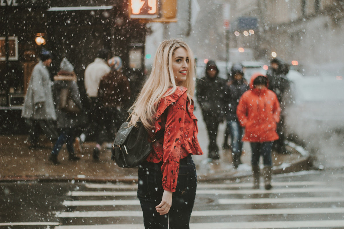 Woman in a winter coat on a city street